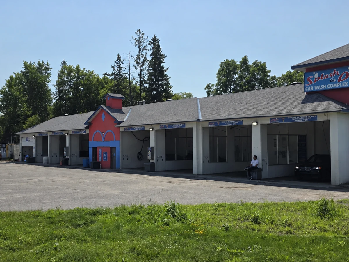 Angled view of the Splash & Dash building and tower sign