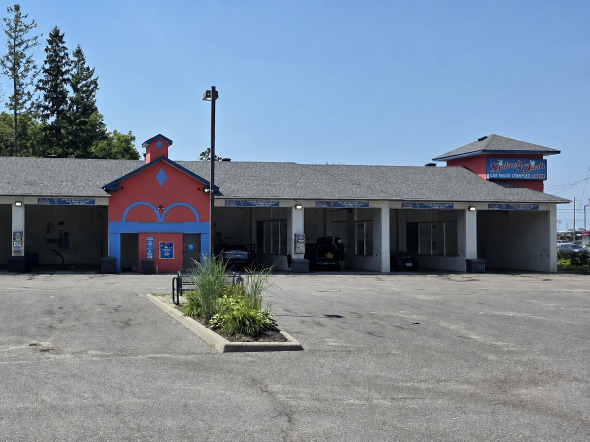 Front view of all seven Splash & Dash car wash bays